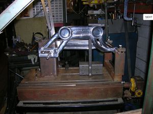 ride magazine swinging arm